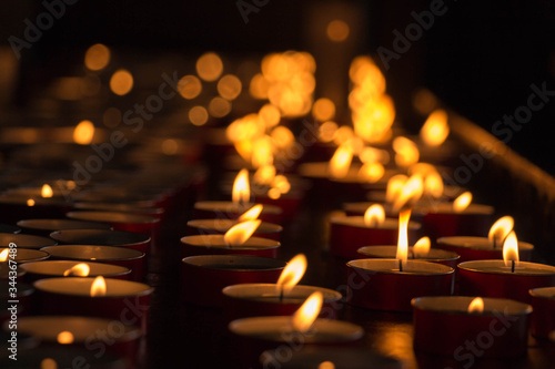 Tableau sur toile The view of lighted tealight candles. Burning candles.