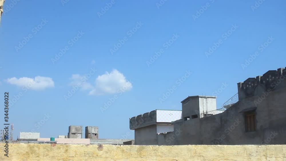 Time laps of clouds over house Time laps of clouds over house