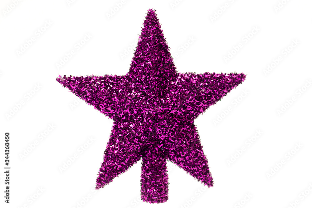 Obraz premium Estrella, adorno navideño para el árbol de navidad, color violeta, punta del árbol, sobre fondo blanco.