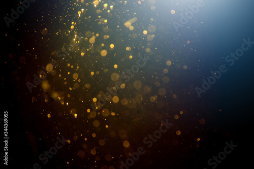 Dark Abstract Gold bokeh sparkle