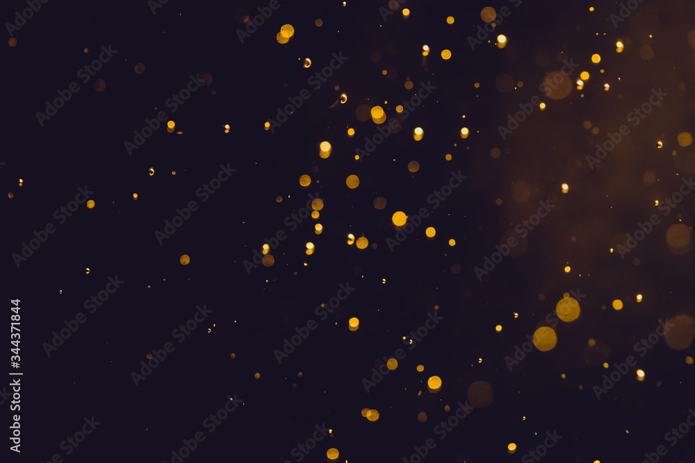 Dark Abstract Gold bokeh sparkle on black Dark Abstract Gold bokeh sparkle on black