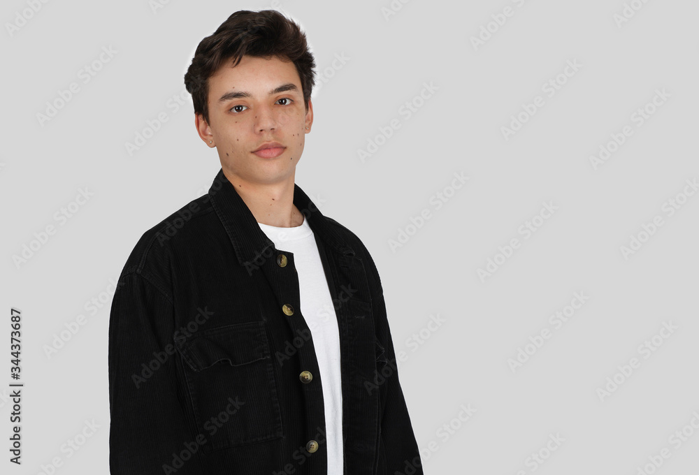 Young Attractive Male Model in Studio Against a White Backdrop Half-body Portrait Low Angle Young Attractive Male Model in Studio Against a White Backdrop Half-body Portrait Low Angle