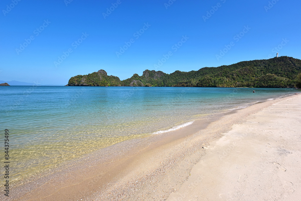 Tanjung rhu beach, Langkawi island Malaysia. Beautiful beach over the bkue sky background. Tanjung rhu beach, Langkawi island Malaysia. Beautiful beach over the bkue sky background.