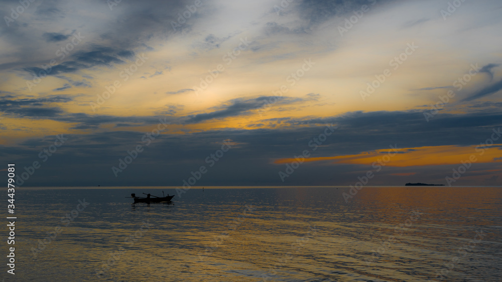 Boats at anchor in the Gulf of Thailand at sunset