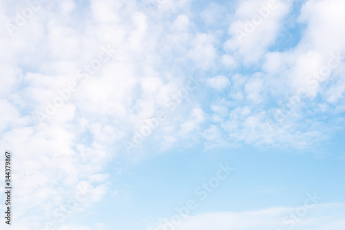 Blue sky with white clouds. The background for the signature.