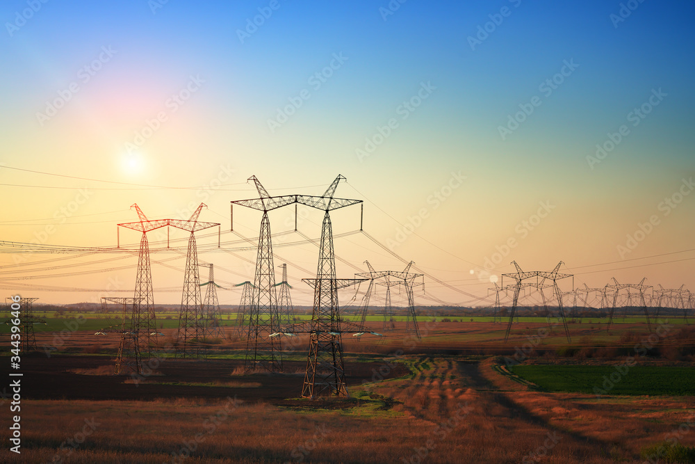 High voltage electric tower on sunset time. sunset sky background. Power Tower