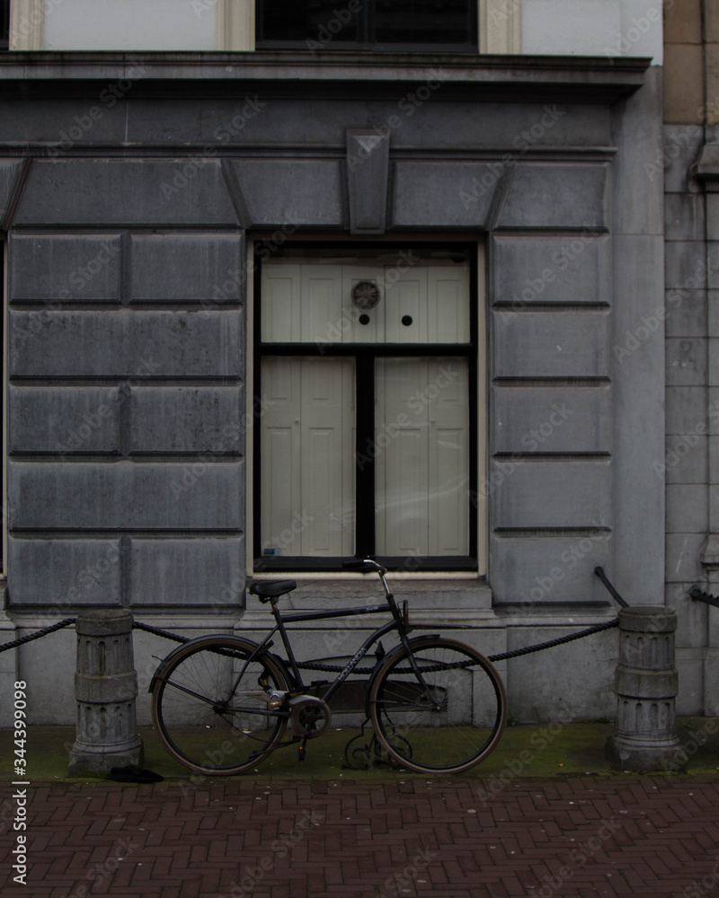 old house with a bicycle