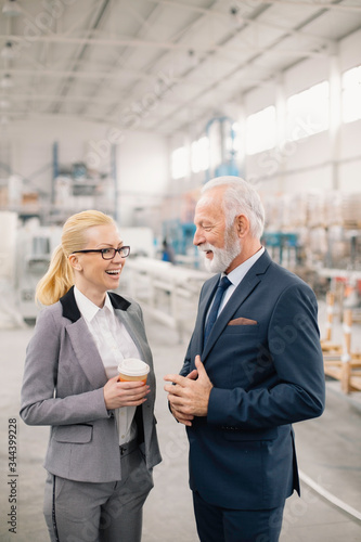 Man and woman discussing work 