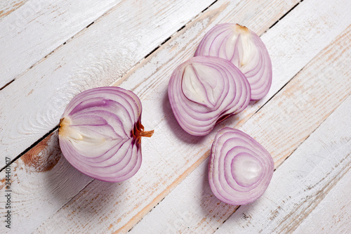 Red onion  lettuce. Health benefits  very rich in vitamins. Background for vegetables and garden plants and cooking.