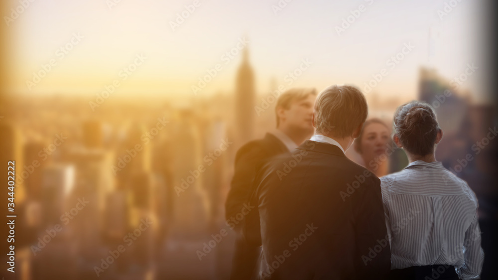 Fototapeta premium Businessmen and businesswomen is looking cityspace view very happy successful.Male and Female conference meeting customer about investment digital marketing financial technology on tall building 