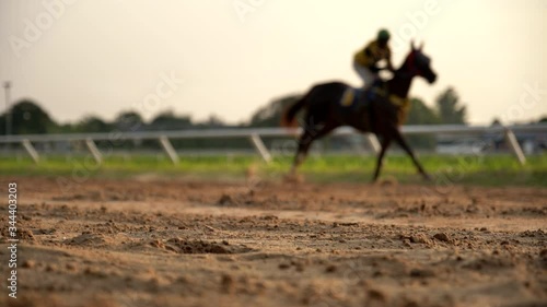 Video slow motion of horse racing at the racetrack, Group of jockey compete in horse races in slow motion, Horse riding competition in slow motion