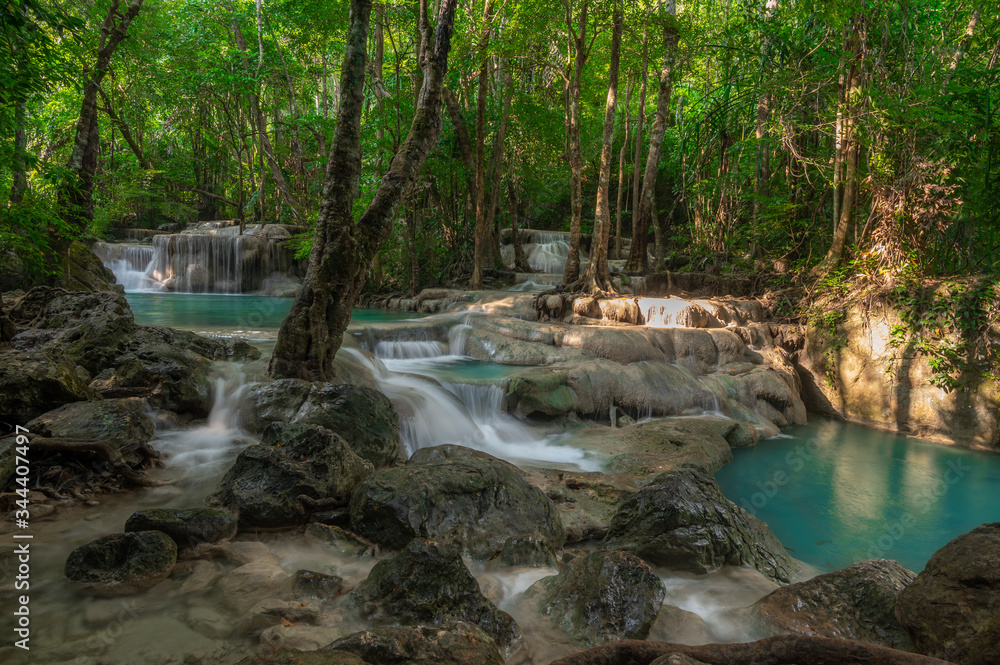 A beautiful waterfall deep in the tropical forest, steep mountain adventure in the rainforest. A beautiful waterfall deep in the tropical forest, steep mountain adventure in the rainforest.