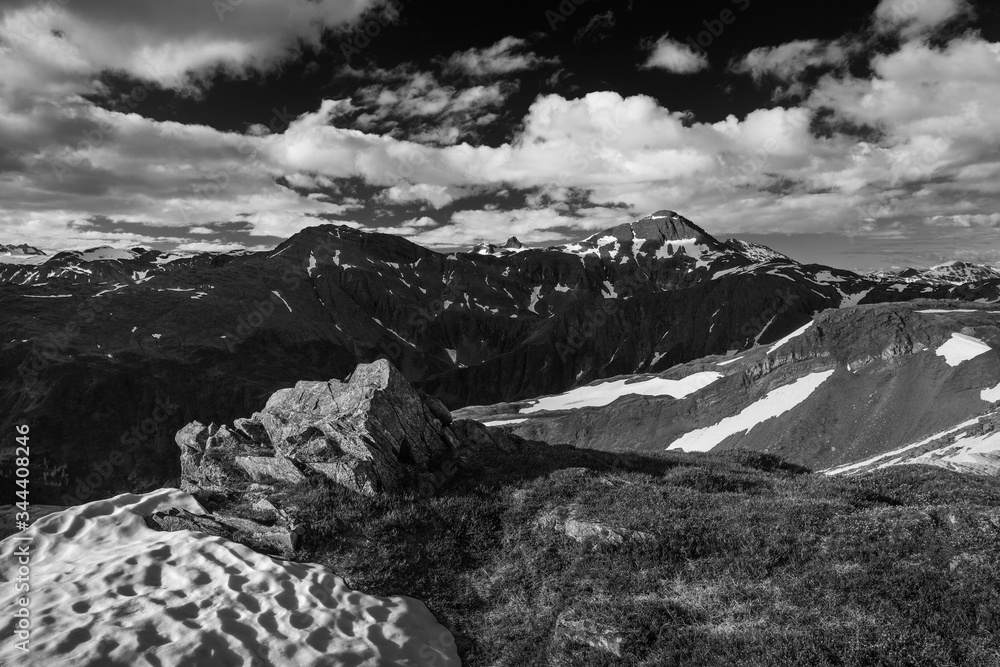 black and white mountain landscape with snow