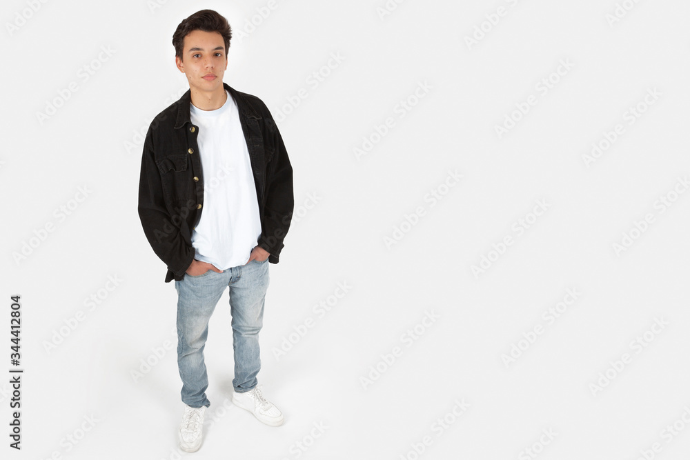 Young Attractive Male Model in Studio Against a White Backdrop in Bird’s-eye View Young Attractive Male Model in Studio Against a White Backdrop in Bird’s-eye View