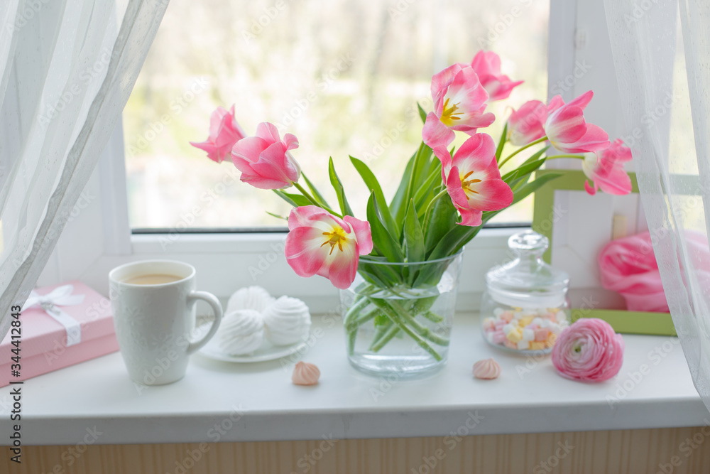 a vase of flowers is on the window a Cup of tea marshmallows, a good morning card a vase of flowers is on the window a Cup of tea marshmallows, a good morning card