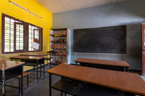 Empty classroom with desks in Indian school