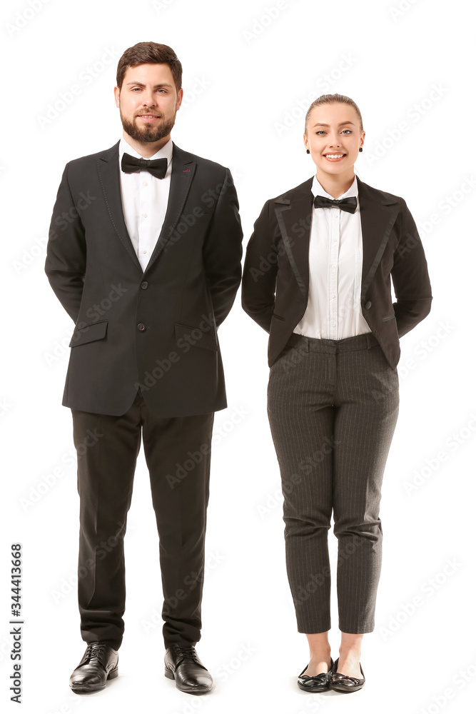 Male and female waiters on white background Male and female waiters on white background