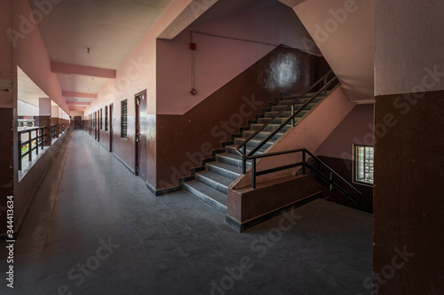 Empty corridor and staircase of school in India
