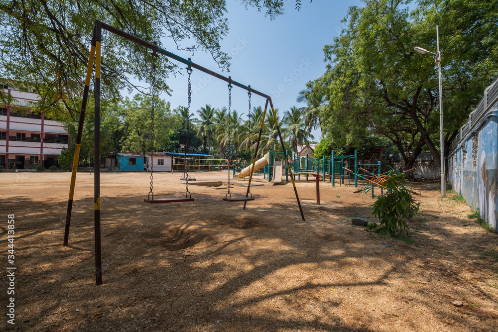 Fototapeta premium Empty playground at urban school in India