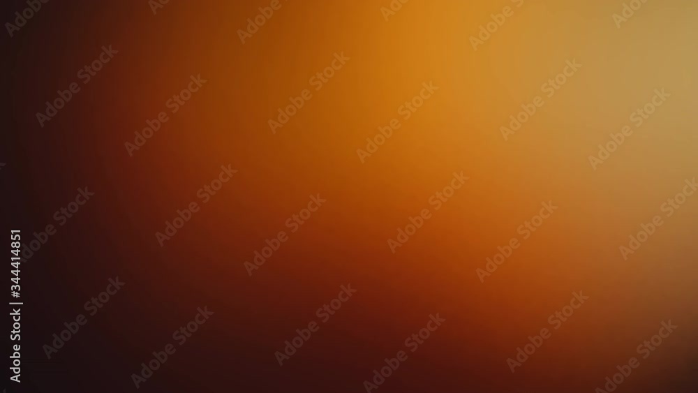 Warm color motion gradient background with seamless loop repeating. Abstract orange color light background animation with smooth blurred gradient.