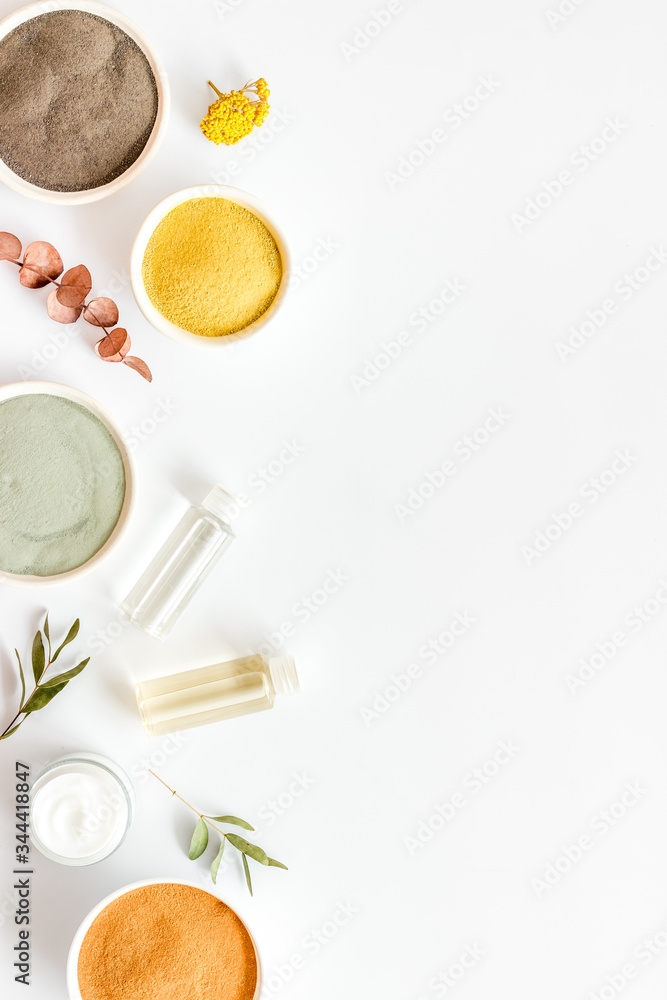 Various kinds of cosmetic clay on white desk top view copy space Various kinds of cosmetic clay on white desk top view copy space