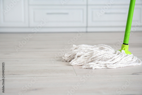 Mopping of floor in kitchen