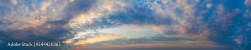 Natural background of the colorful panorama sky. Beautiful cloud in the sunrise sky background. Sky banners background. © Pakhnyushchyy