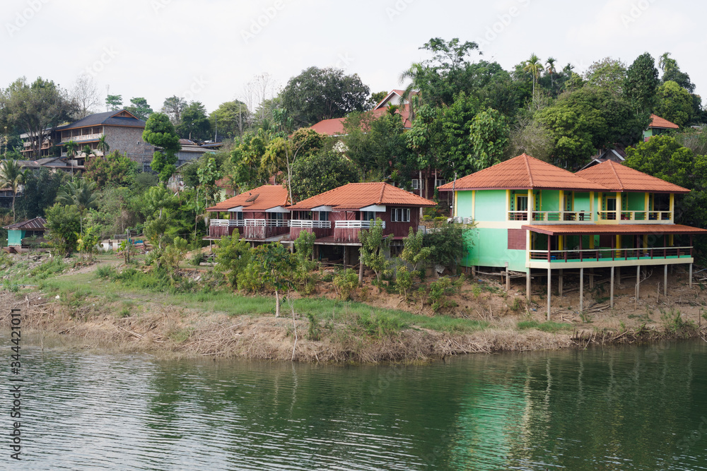 lakeside houses, hostels or resorts and forest