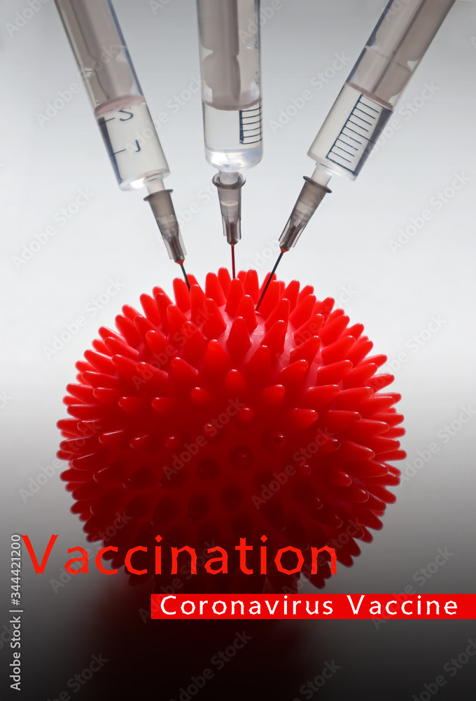 Coronavirus model and syringe with vaccine. Injection of a cure for the COVID-19 virus. Medical concept of vaccination and the fight against the epidemic and pandemic. Coronavirus model and syringe with vaccine. Injection of a cure for the COVID-19 virus. Medical concept of vaccination and the fight against the epidemic and pandemic.