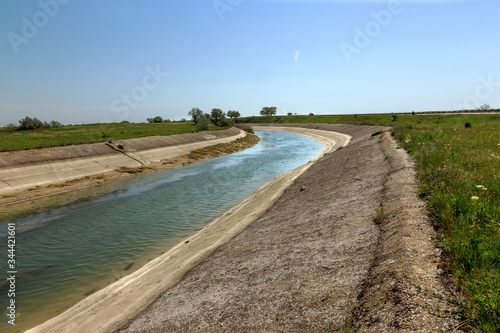 Crimea  Russia  2014  Rice irrigation canal after fresh water inflow plate from mainland Ukraine. Water Crimea blockade Artificial drought  collapse of agriculture irrigated agriculture