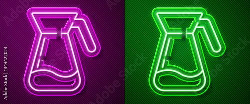 Glowing neon line Jug glass with water icon isolated on purple and green background. Kettle for water. Glass decanter with drinking water. Vector Illustration