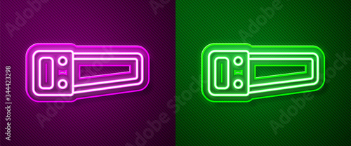 Glowing neon line Hand saw icon isolated on purple and green background. Vector Illustration