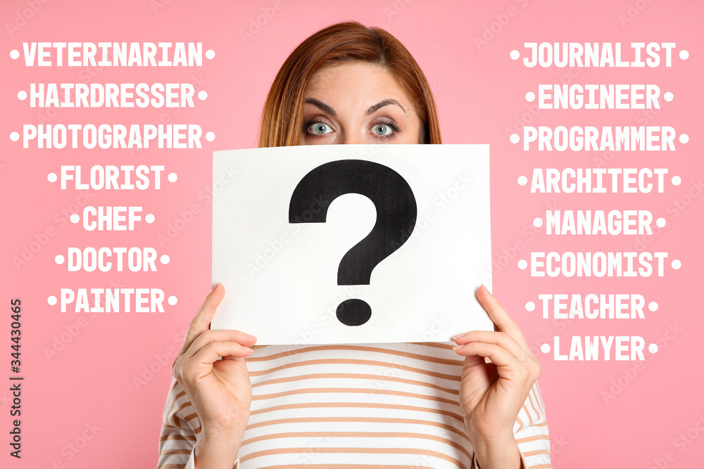 Puzzled woman with question mark sign choosing profession on pink background Puzzled woman with question mark sign choosing profession on pink background