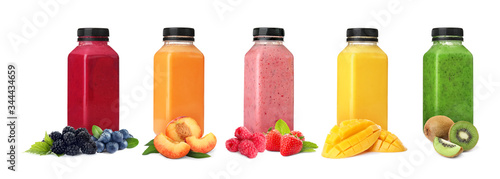 Different delicious smoothies in bottles on white background. Banner design