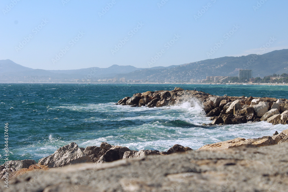 waves crashing on rocks