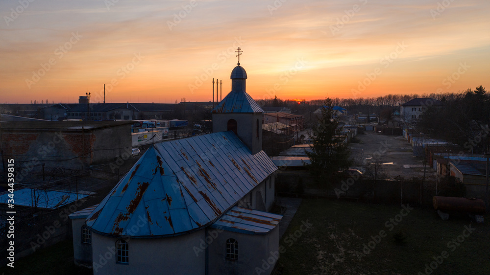 Obraz premium sunset over the church