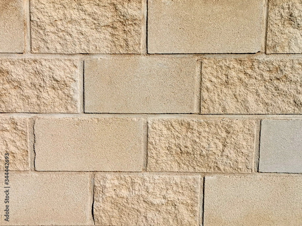 Fototapeta premium tile of plaster on the wall , smooth and textured staggered