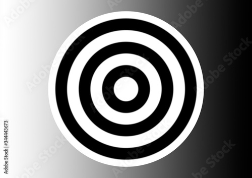 black and white image of a dart board with a white center on a gradient background