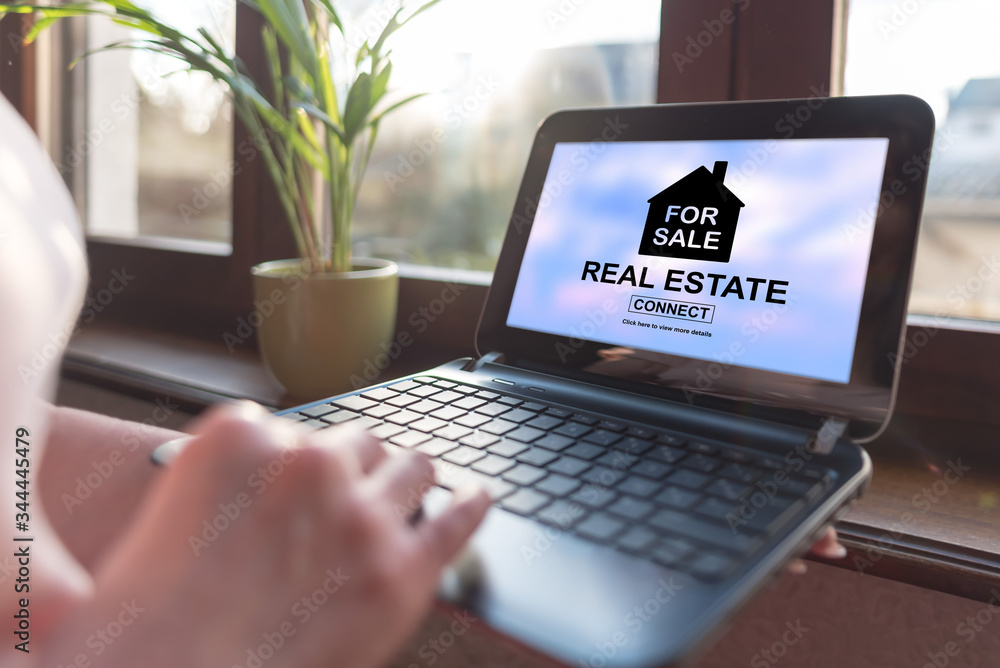 Real estate concept on a laptop screen Real estate concept on a laptop screen
