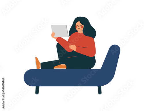 Young woman is sitting on the couch and watching videos on the tablet pc. The female user of social media networks. Girl resting and spending time online at home. Vector illustration