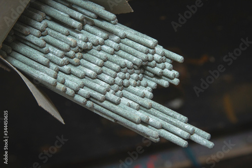 Close-up industrial arc stick welding electrodes
