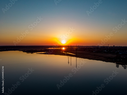 Beautiful areal drone view of sunset and river Lielupe.