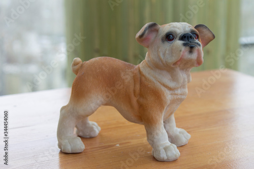 statuette of an English bulldog puppy in a pose for reference