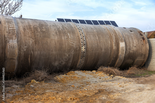 Large metal stainless steel overpass pipe for aggressive environments. Construction of a large industrial trunk overpass