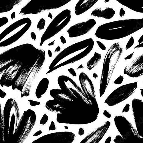 Brush black loose leaves and flowers vector seamless pattern. Hand drawn black paint ink illustration with abstract floral motif.