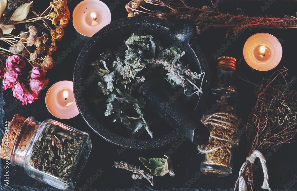 Kitchen witchery using herbs and spices found at home. Herbal magick in  wicca and witchcraft with