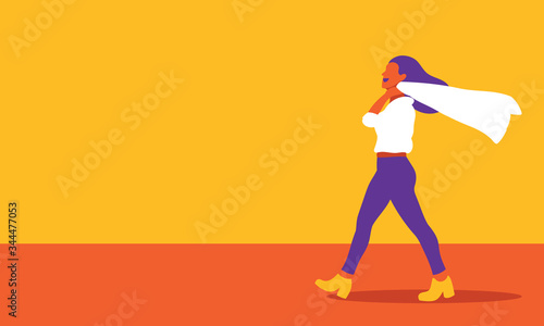 Girl holds the jacket on the shoulder, happily walks on the street