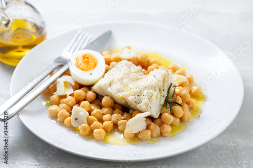 Wallpaper Mural boiled cod fish with chickpea and boiled egg on white plate Torontodigital.ca