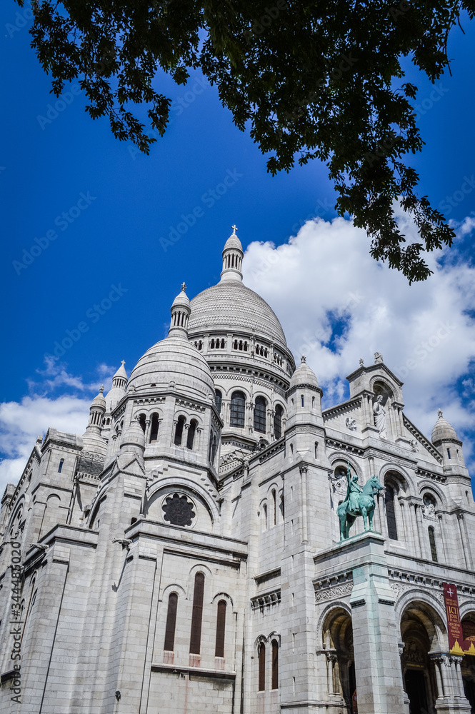 View of the famous Sacre Coeur Cathedral during summer time in Paris, France