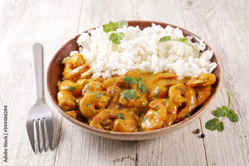rice and shrimp cooked with coconut milk and spicy rice and shrimp cooked with coconut milk and spicy